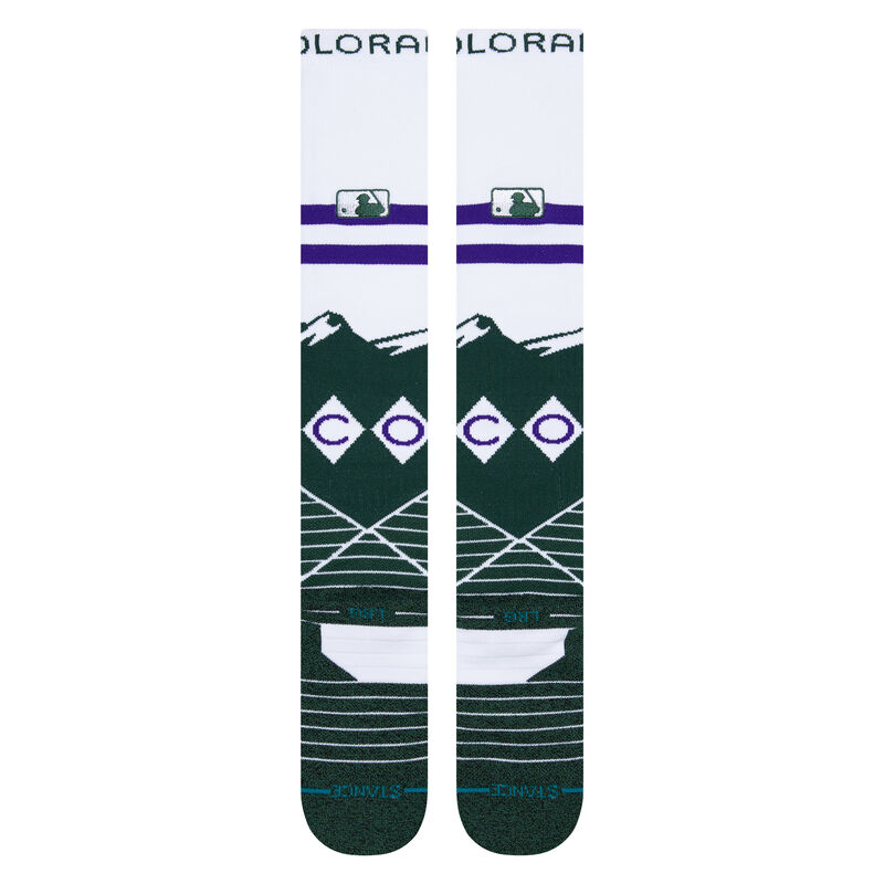 Fans wearing Stance MLB Colorado Rockies 2022 City Connect OTC Socks, enjoying a baseball game in style.