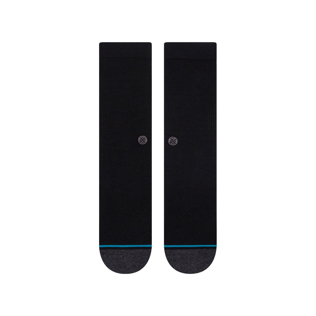 Stance mens Icon St Crew socks in Black, showcasing the luxurious combed cotton blend and seamless toe closure for ultimate comfort.