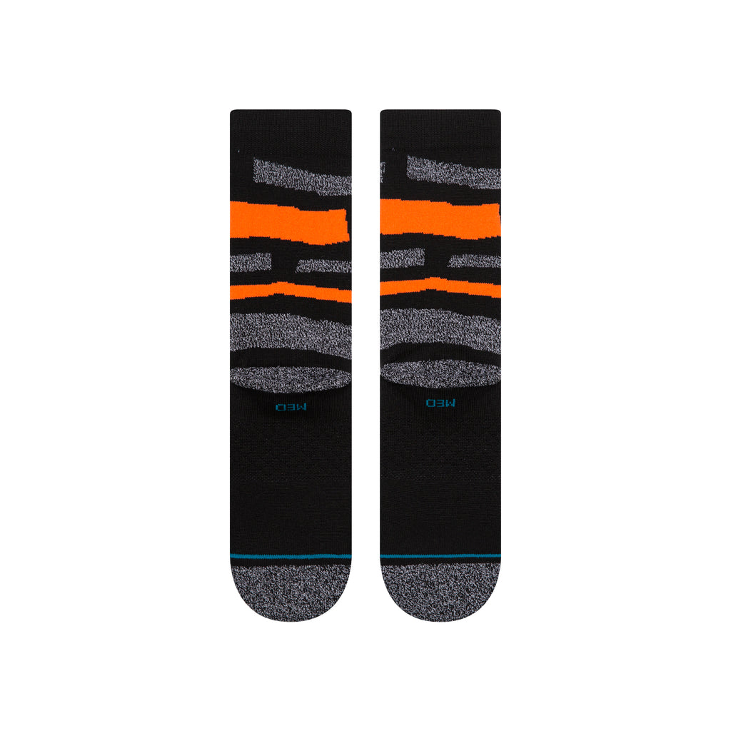 Stance MLB 2025 Squeeze Crew Socks modeled on a person, demonstrating style and support for San Francisco Giants during sports and casual wear.