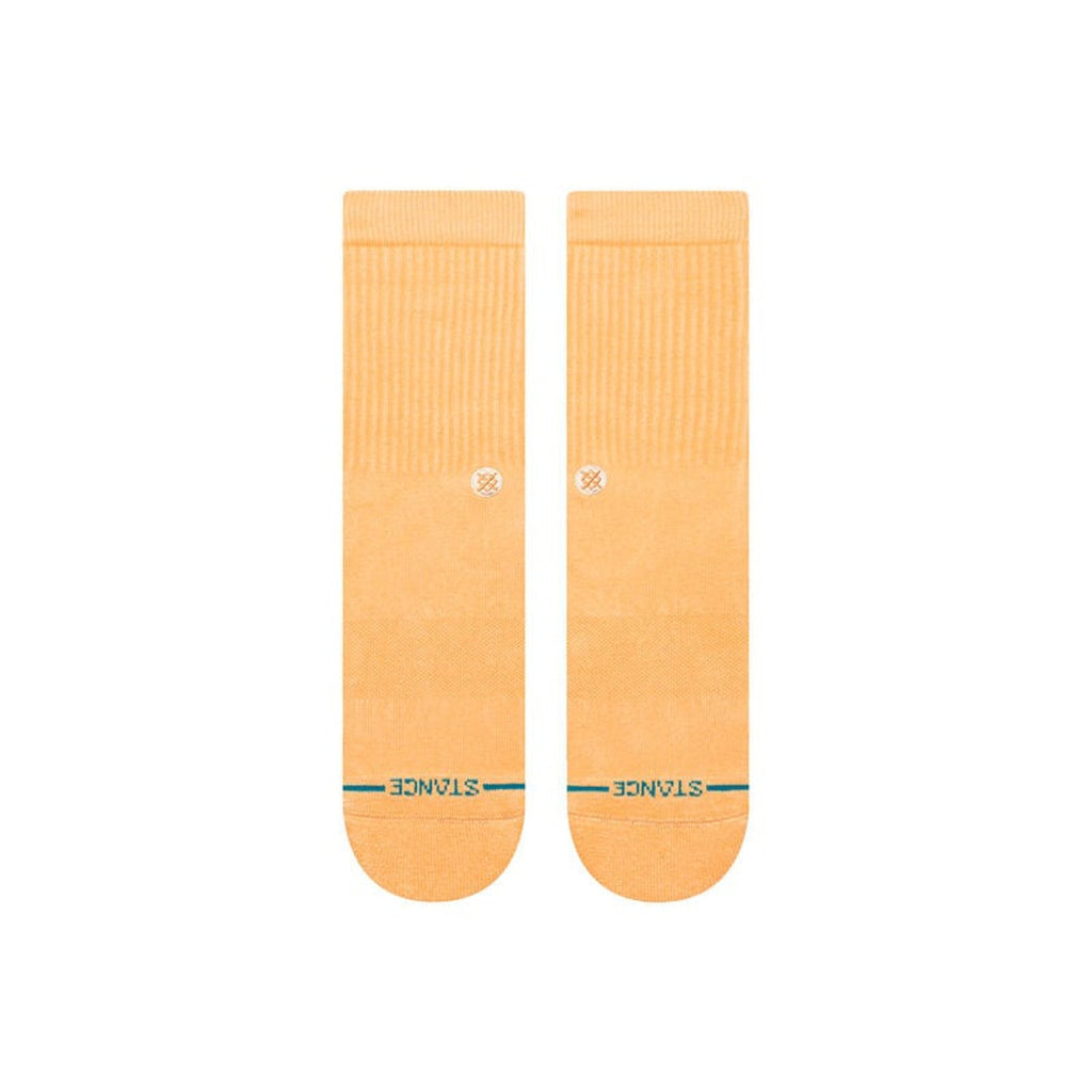 Close-up view of the Stance mens Icon Crew socks in Washed Peach, featuring medium cushioning and seamless toe for added comfort.