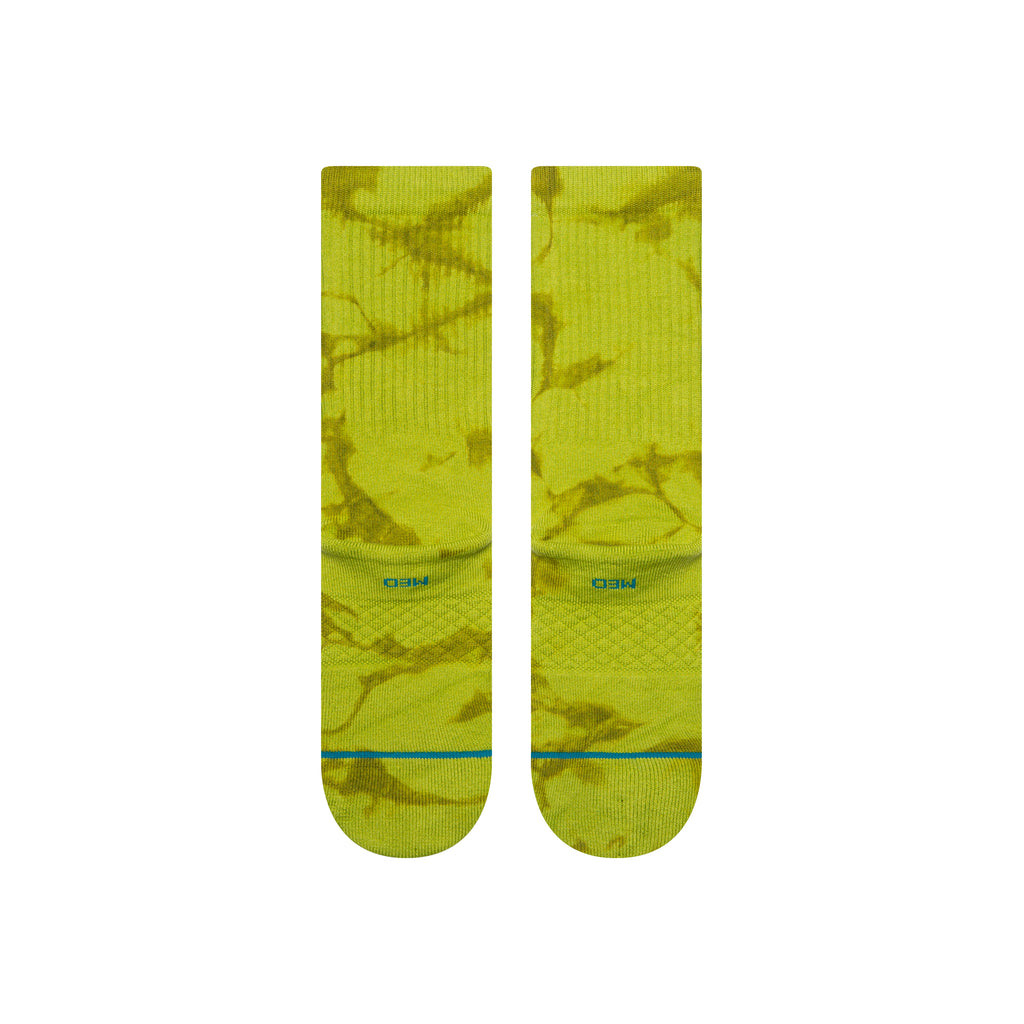 Lifestyle image of Stance mens Icon Dyed Crew socks worn during a casual outing, demonstrating medium cushioning and targeted support.