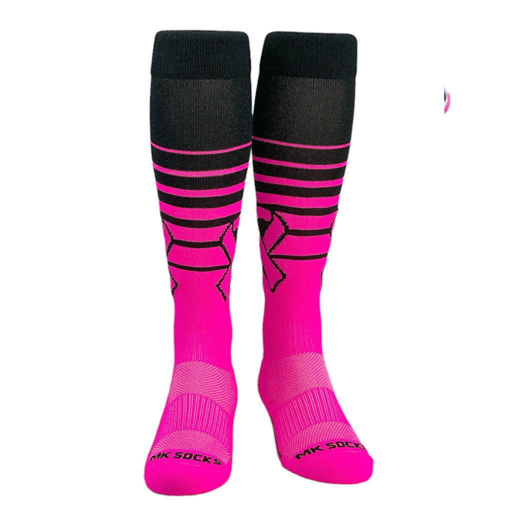 A pair of pink knee high socks with black stripes and a breast cancer awareness ribbon design.