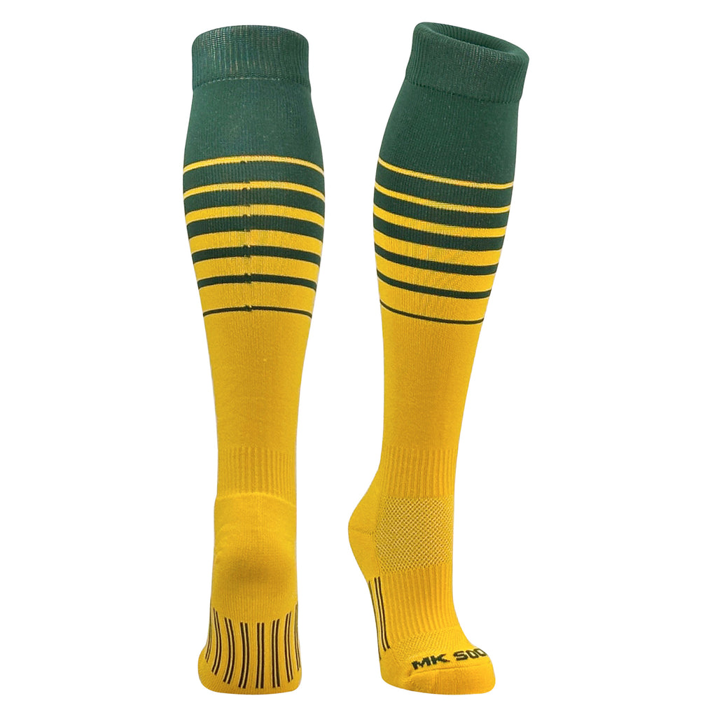 A pair of knee-high sports socks with a fade stripe pattern, primarily dark green and gold