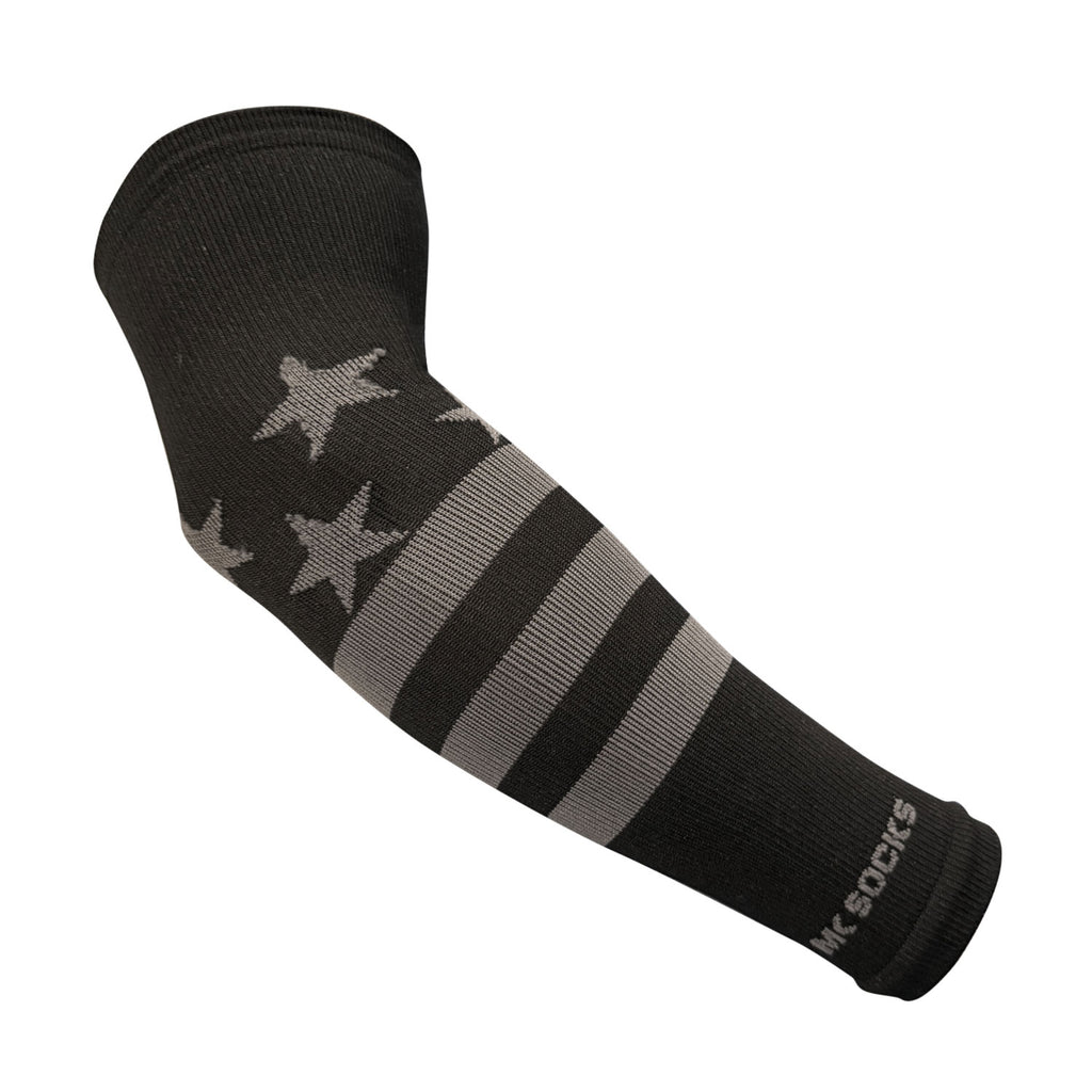 Baseball & Football Compression Sleeve with Sleek, Low-Profile Patriotic Black and Graphite American Flag Design