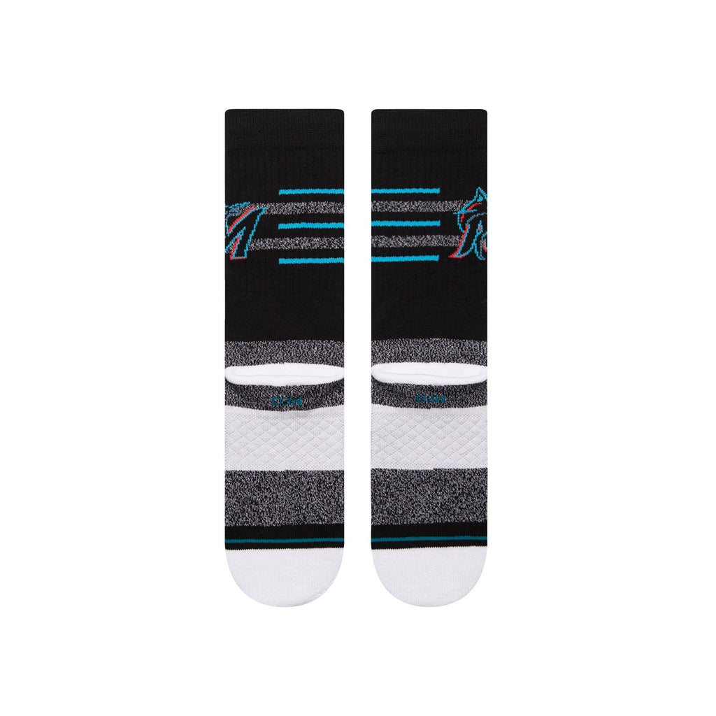 Lifestyle image of the Stance MLB Miami Marlins 2024 Closer Crew Socks being worn during a baseball game, highlighting comfort and team spirit.