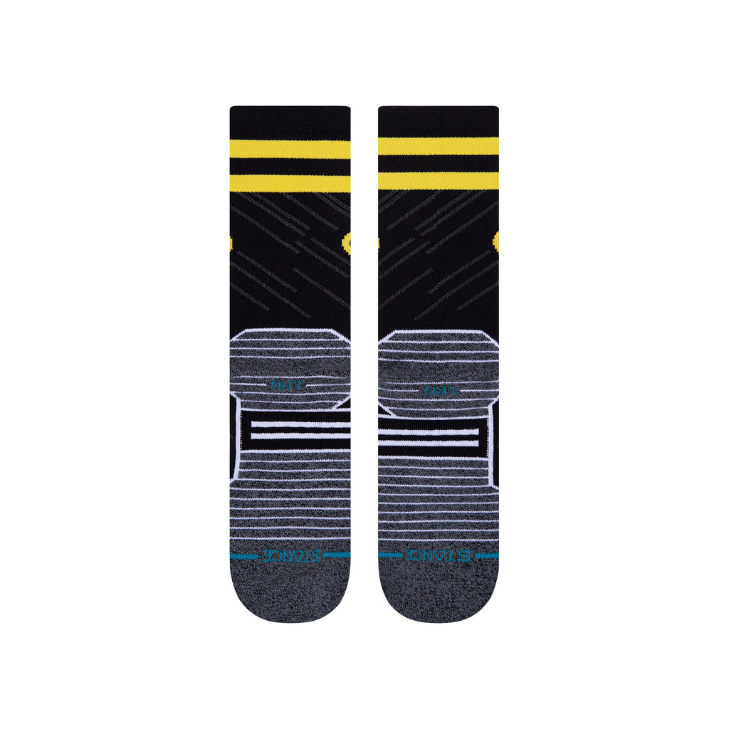 Lifestyle image featuring someone wearing Stance DC Comics Batman The Dark Knight Crew socks, demonstrating their stylish look and comfort.