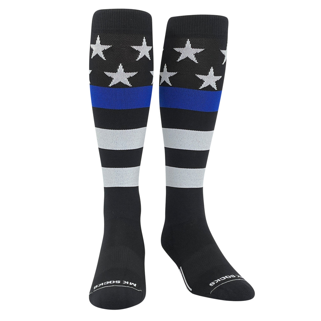 A pair of knee-high sports socks featuring a USA flag with stars and stripes and a blue line design on a black background.