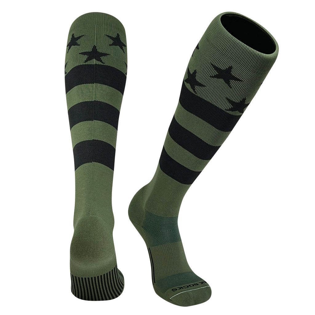 A pair of knee-high sports socks with a USA flag design in olive green and black featuring stars and stripes used in baseball and football.